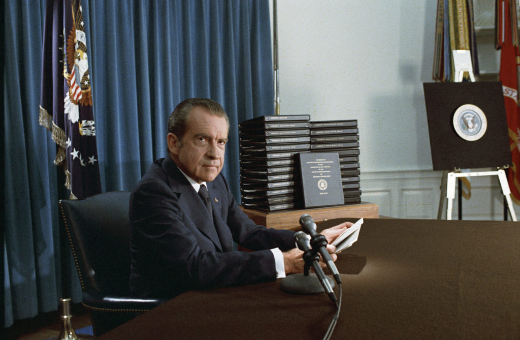 President Nixon with his edited transcripts of the White House Tapes subpoenaed by the Special Prosecutor, during his speech to the Nation on Watergate.